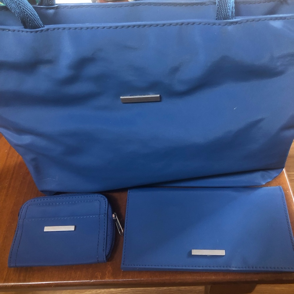 matching  Vtg. Yves Rocher promotional nylon bag set.